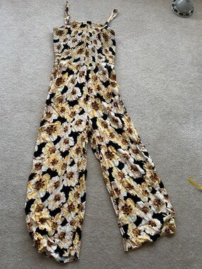 Maurices Black Floral Smocked Wide-Leg Jumpsuit with Yellow Accents